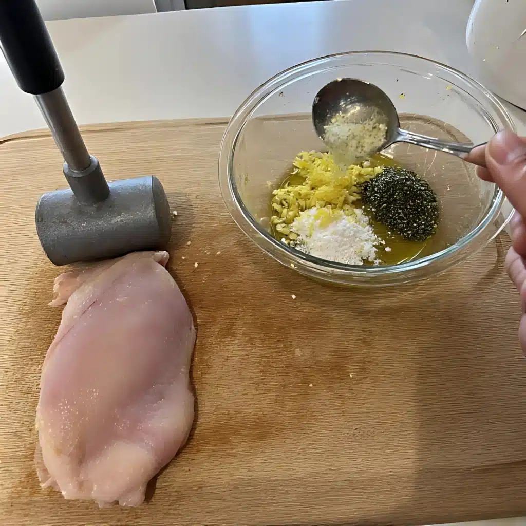 Lemon Garlic Chicken with Roasted Veggies (Gluten Free, 20 Minutes) 3 preparing chicken for lemon garlic chicken with roasted veggies recipe