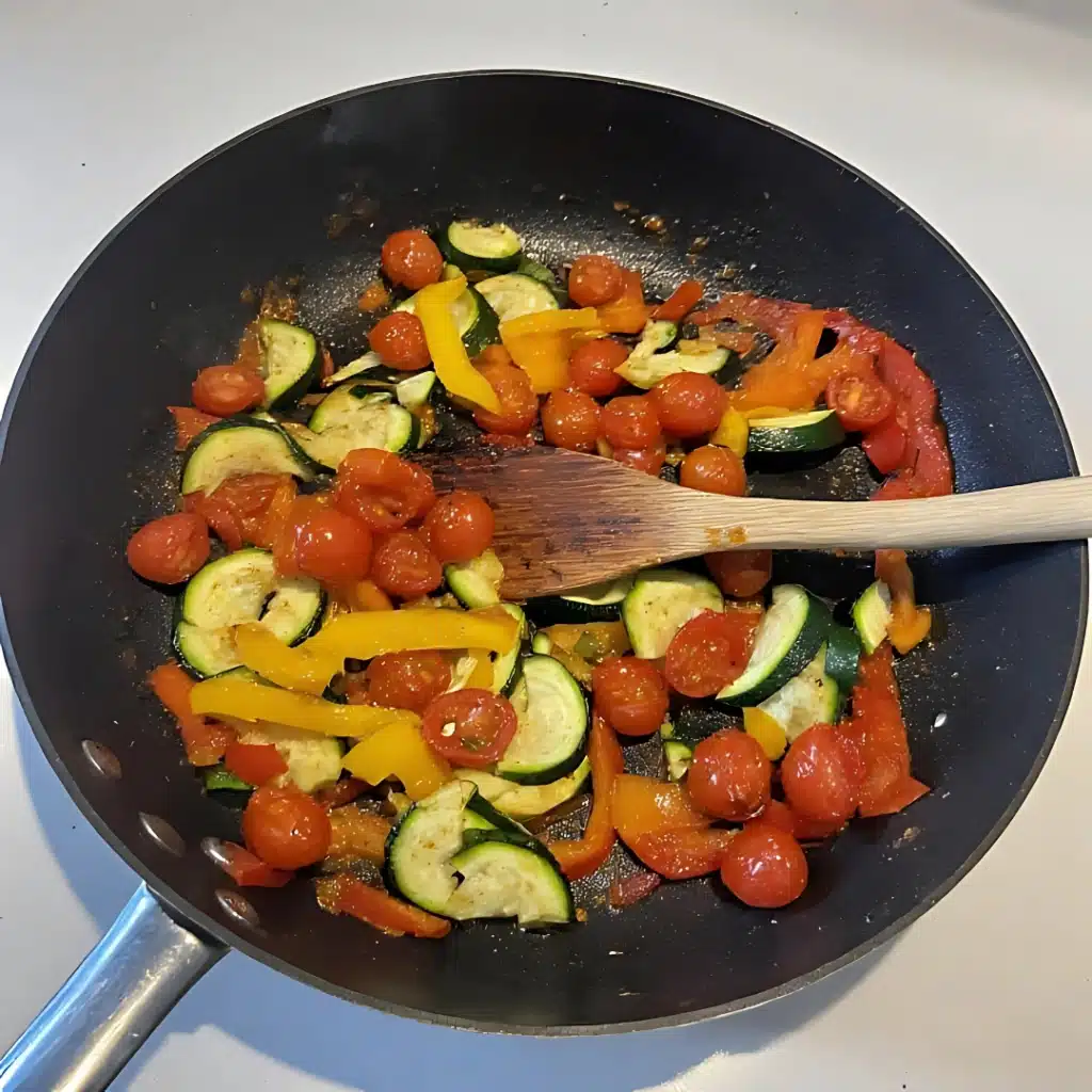 Lemon Garlic Chicken with Roasted Veggies (Gluten Free, 20 Minutes) 5 sautéing vegetables for lemon garlic chicken with roasted veggies