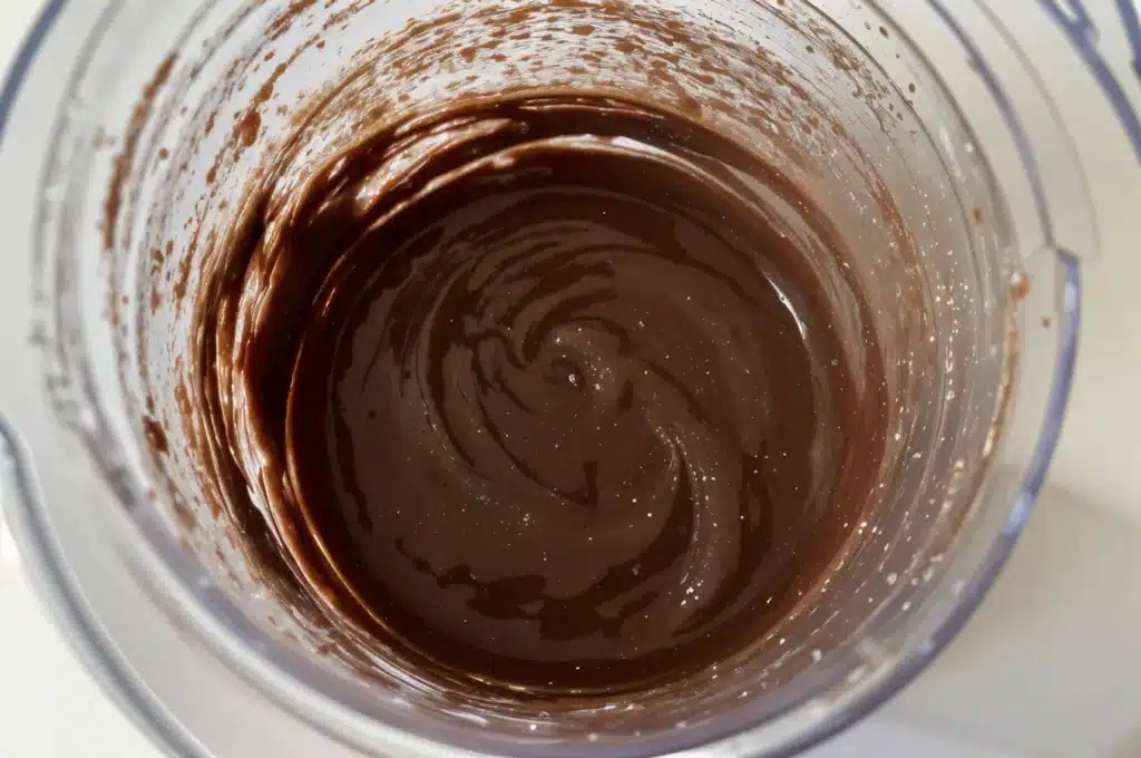 Chocolate Dairy-Free Ice Cream – Budget-Friendly Healthy Dessert 3 Chocolate dairy-free ice cream base blending in a blender.