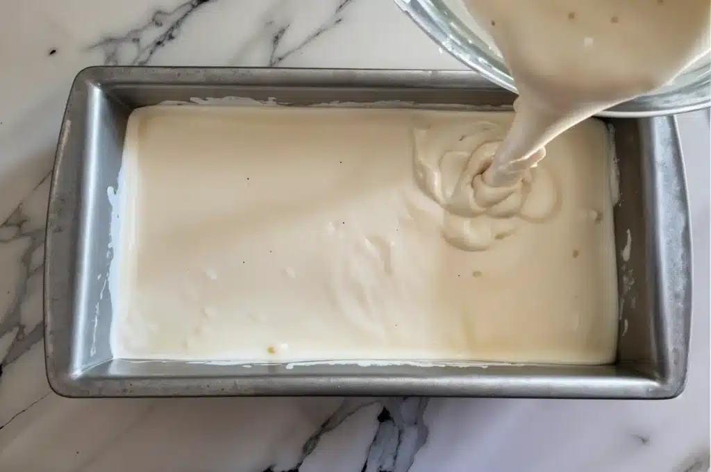 Creamy Coconut Milk Ice Cream – Dairy-Free, No-Churn Recipe 5 Coconut milk ice cream in loaf pan ready to freeze.