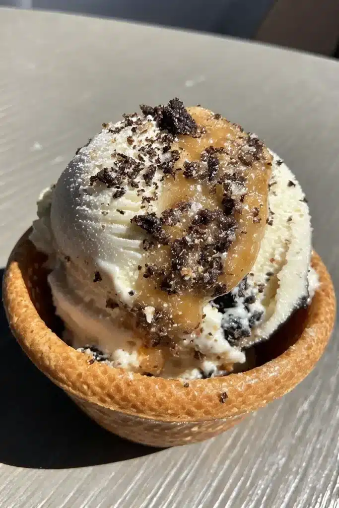 Creamy Vanilla Dairy-Free Ice Cream – Budget-Friendly Healthy Dessert 3 anilla dairy-free ice cream in waffle bowl with cookie crumble topping