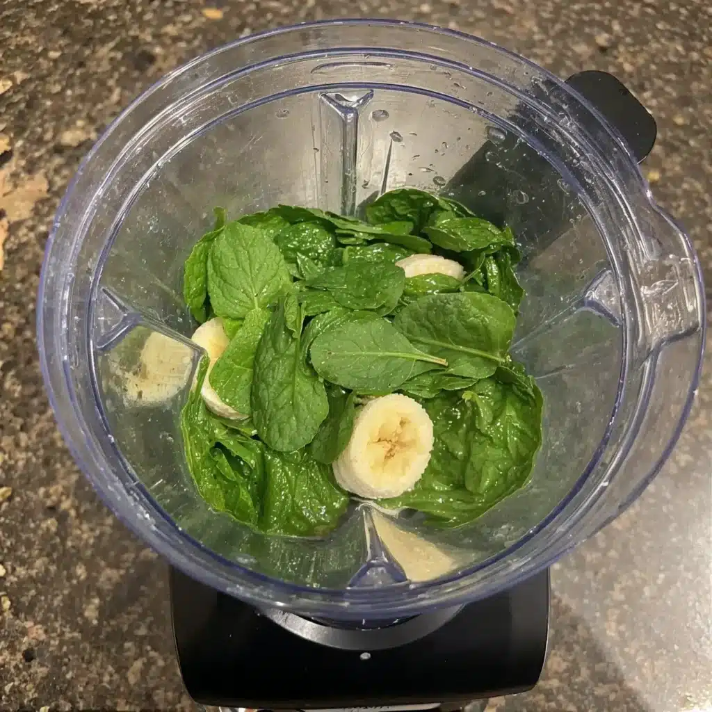 Spinach Banana Hulk Muffins: A Dairy-Free, Nut-Free Power Snack Kids Actually Eat 3 Banana and spinach being blended for Hulk muffins
